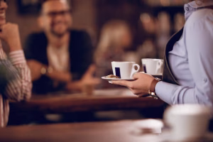 KAFVE | closeup-waitress-carrying-coffee-cups-while-working-cafe_637285-2472